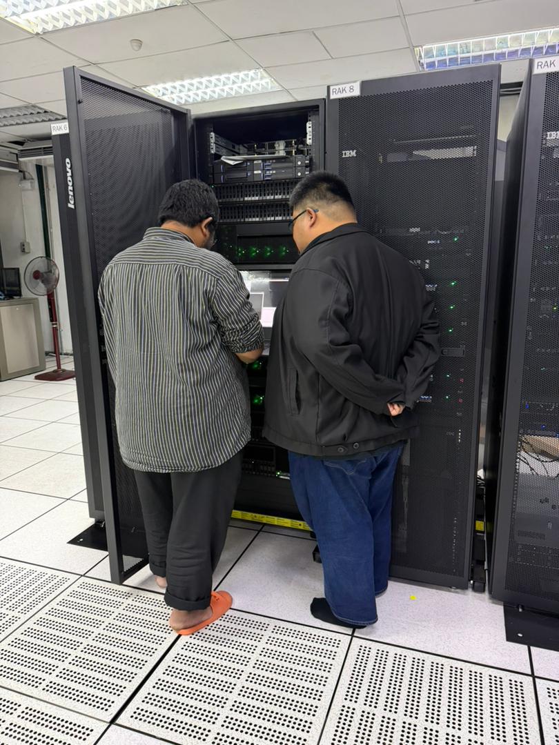 Team working in a data centre